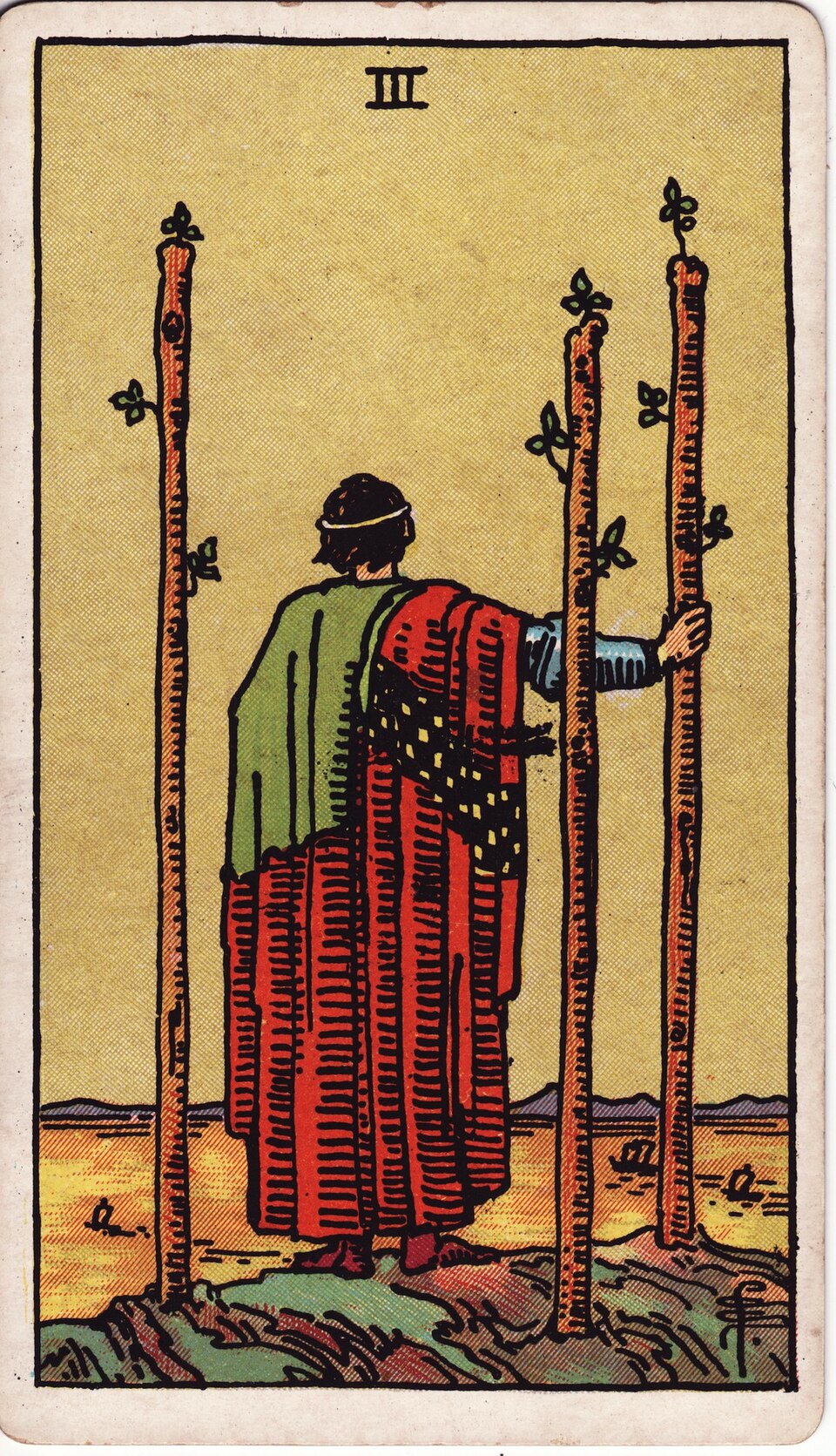 Three of Wands from the Rider–Waite–Smith tarot, 1909, public domain